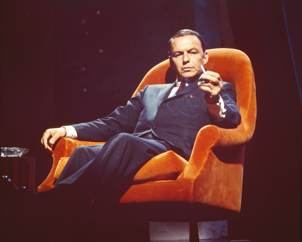 Frank Sinatra in a velvet lounge chair