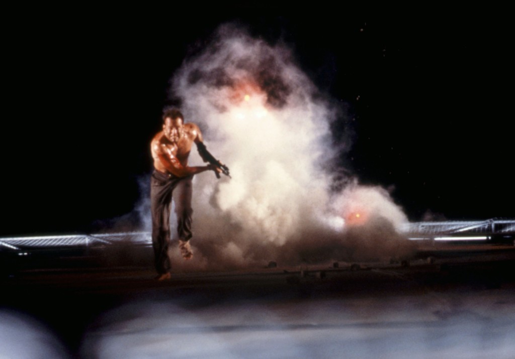 Bruce Willis running from a fireball in "Die Hard."