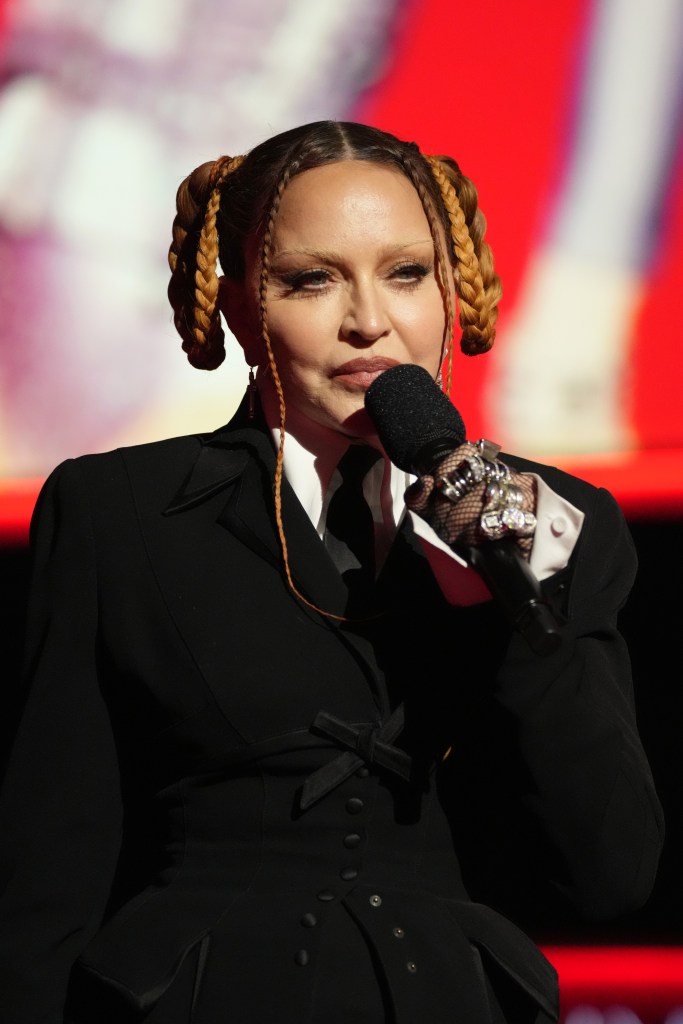 Madonna speaks onstage during the 65th GRAMMY Awards.