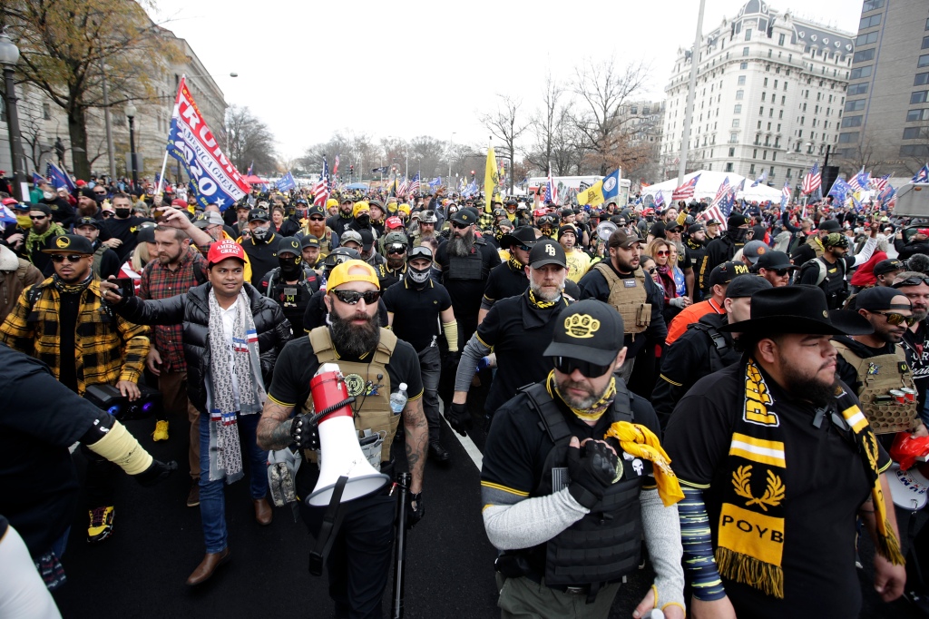 Supporters of President Donald Trump wearing attire associated with the Proud Boys attend a rally at Freedom Plaza, Dec. 12, 2020.