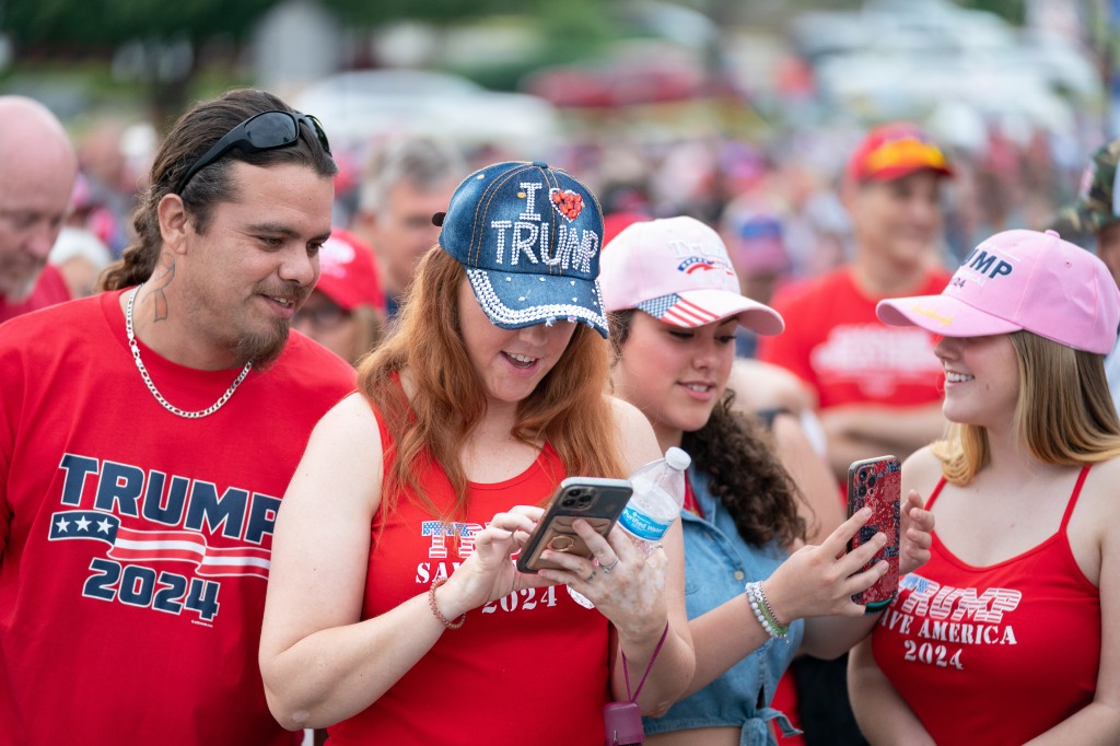 Supporters of former President Donald Trump wait in line before a presidential campaign event on July 1, 2023, in Pickens, South Carolina.
