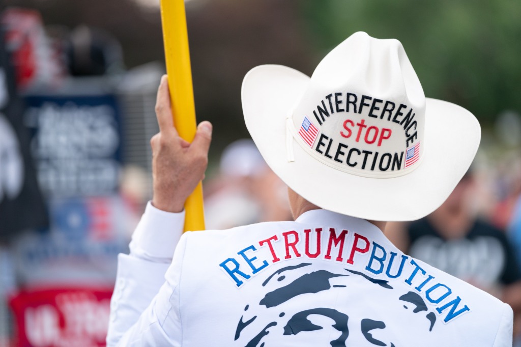 A supporter of former President Donald Trump wears a cowboy hat before a presidential campaign event on July 1, 2023 in Pickens, South Carolina.