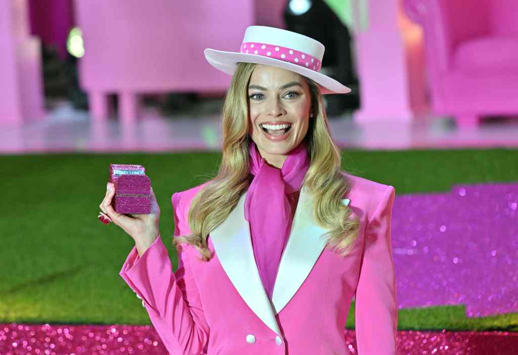 Margot Robbie in a pink suit. 