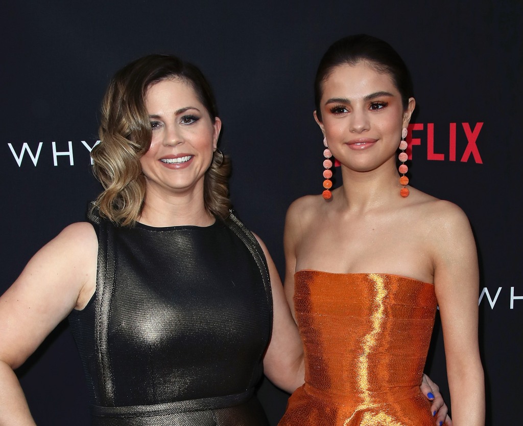 Executive producer Mandy Teefey and daughter actress/executive producer Selena Gomez attend the premiere of Netflix's "13 Reasons Why" at Paramount Pictures in 2017 in Los Angeles, California.