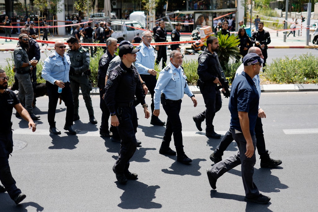 Israeli police were seen walking through the scene of the attack.
