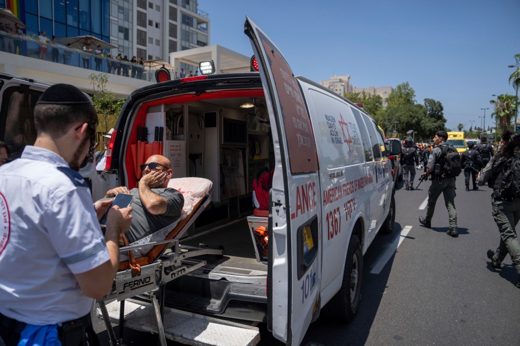 Israeli paramedics said at least four people were wounded when a car careened into pedestrians on a sidewalk. 