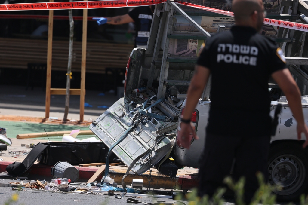 Israeli paramedics said at least four people were wounded when a car careened into pedestrians on a sidewalk.