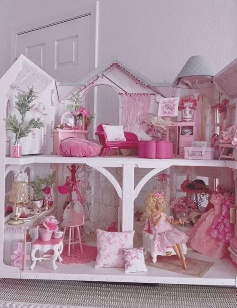 DENA DANIELS' BARBIE AND BARBIE DOLLHOUSE WHICH SHE HAS IN HER HOME