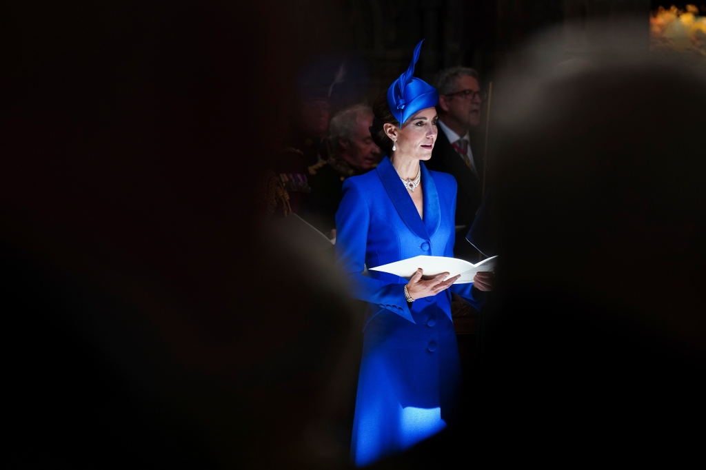 Middleton wore a blue coat dress by Catherine Walker. 