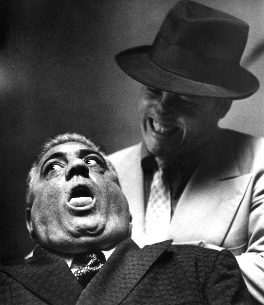 Lenny Montana being strangled in a scene from "The Godfather"