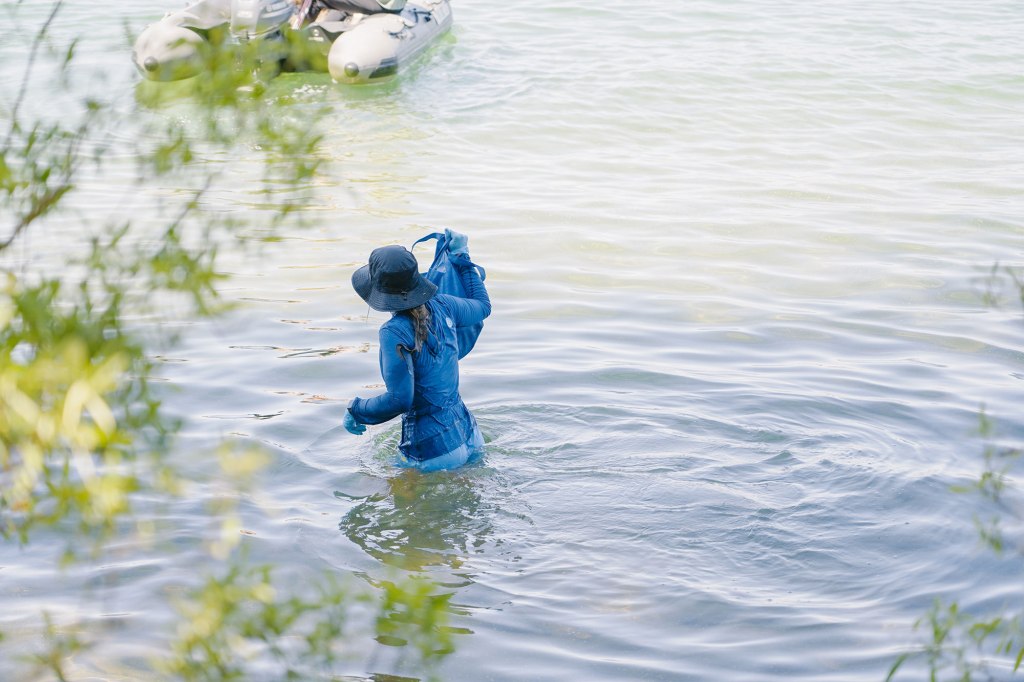 A volunteer wades through the water.


Keep Tahoe Blue volunteers said the lake looked like a "landfill."