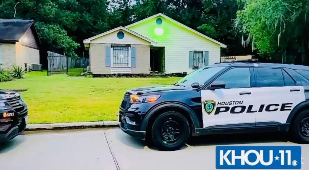 Police at the Houston home of Rudy Farias and his family, including mother Janie Santana. 