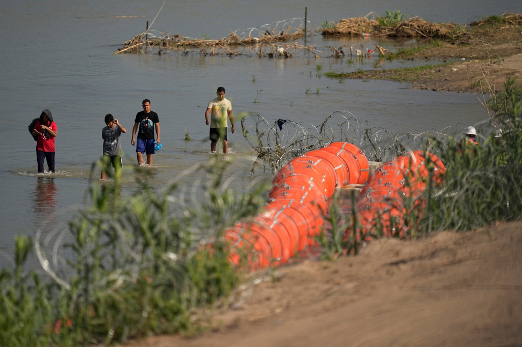 In addition to the river barrier, Texas Gov. Greg Abbott has also ordered state authorities to install razor wire along popular border crossings for illegal immigrants. 