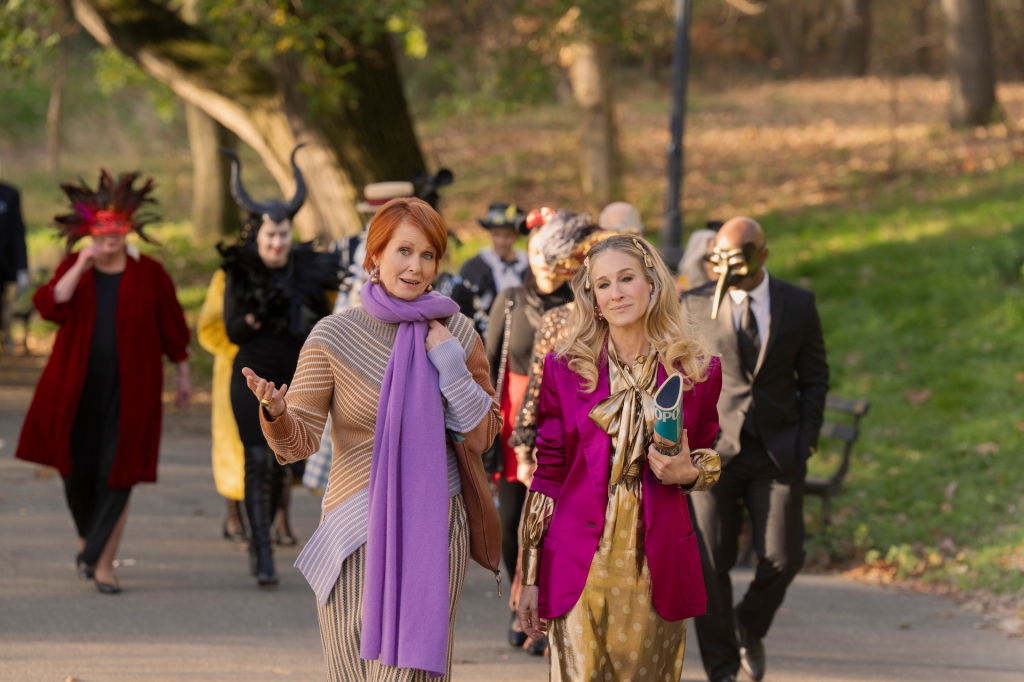 Miranda and Carrie stroll through the park on the way to Charlotte's Halloween party.