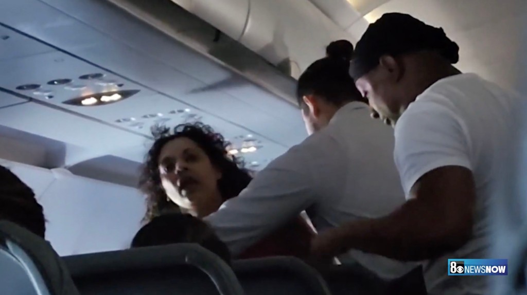 Woman fighting on  Frontier flight