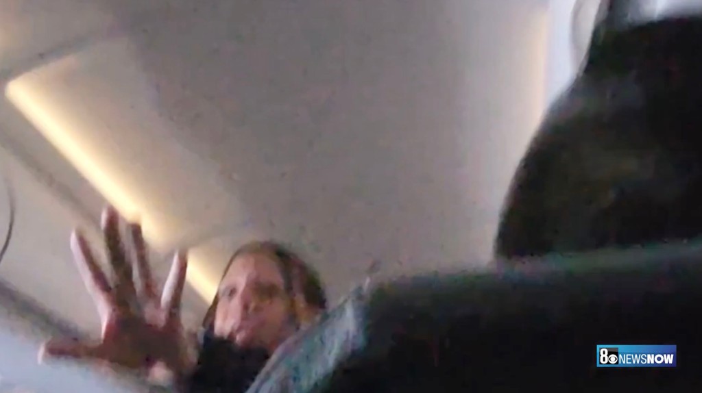 Woman fighting on  Frontier flight