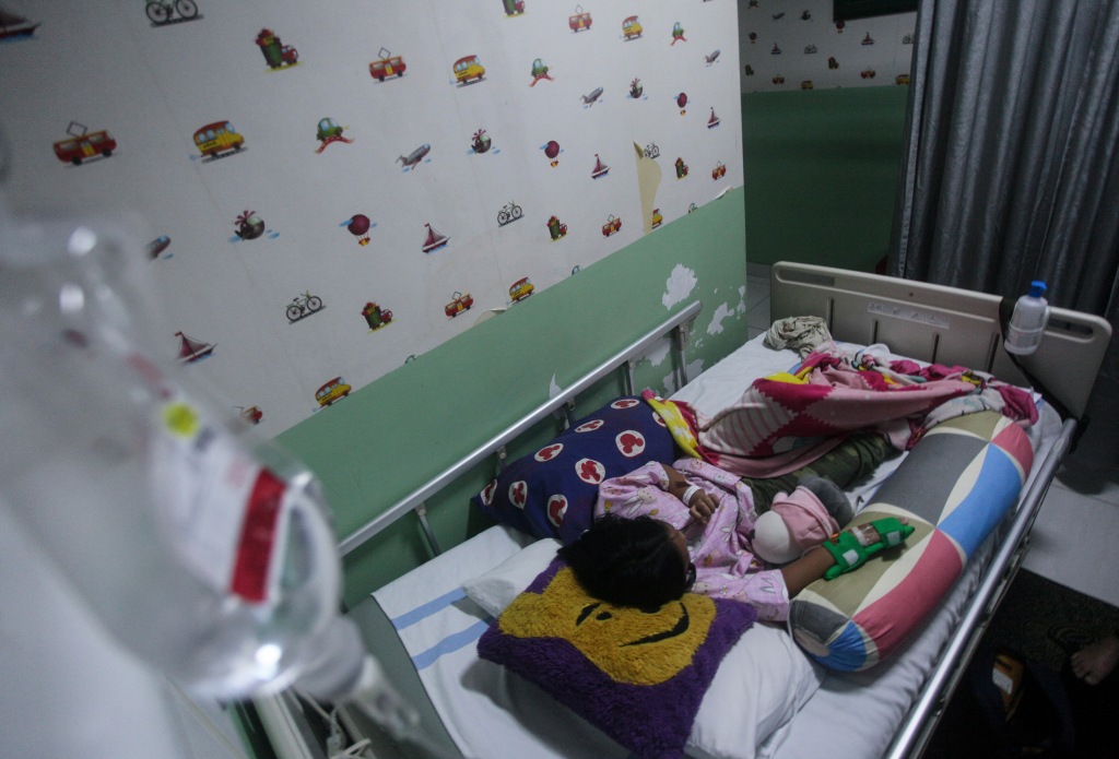 Young child in hospital bed