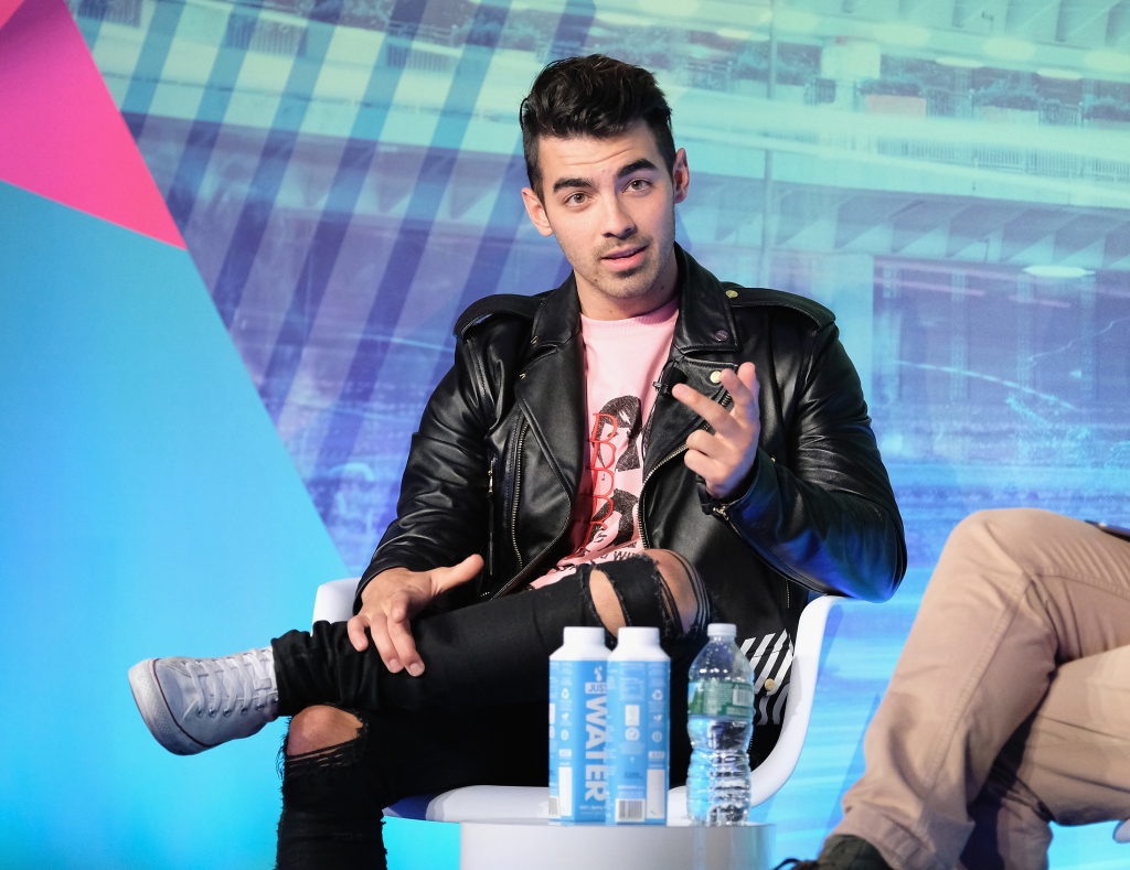 Joe Jonas speaks on stage during the Is Automation the New Curation? panel at the Liberty Theater during 2016 Advertising Week New York on September 26, 2016 in New York City.