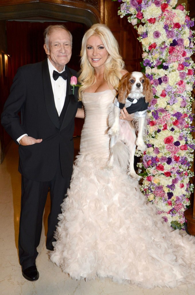 Hugh Hefner, Crystal Hefner (holding a dog) on their wedding day