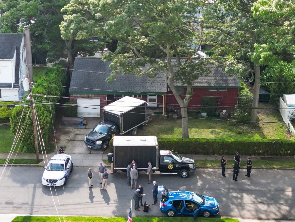 Police outside of Heuermann's house in Massapequa Park during the investigation on July 15, 2023.