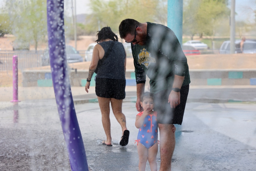 Phoenix residents are doing whatever they can to stay cool amid record-breaking heat.