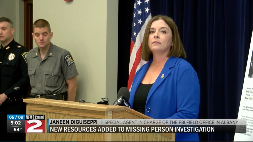 FBI agent Janeen DiGuiseppi at a podium