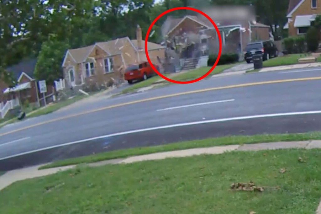 The woman's car crashing into the home in Missouri. 