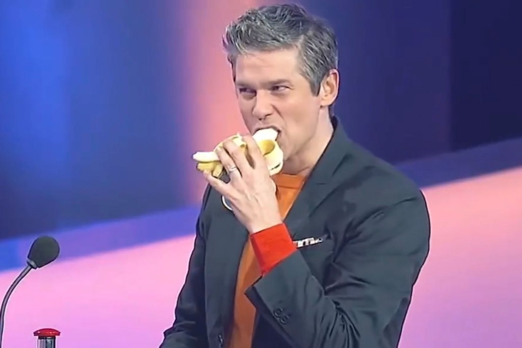 Burtka biting the banana