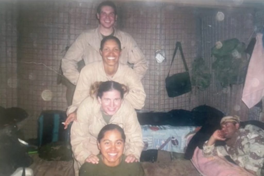 Amy Folwell, 37, from Rochester, New York, and her fellow Lioness soldiers posing for a picture while overseas. 