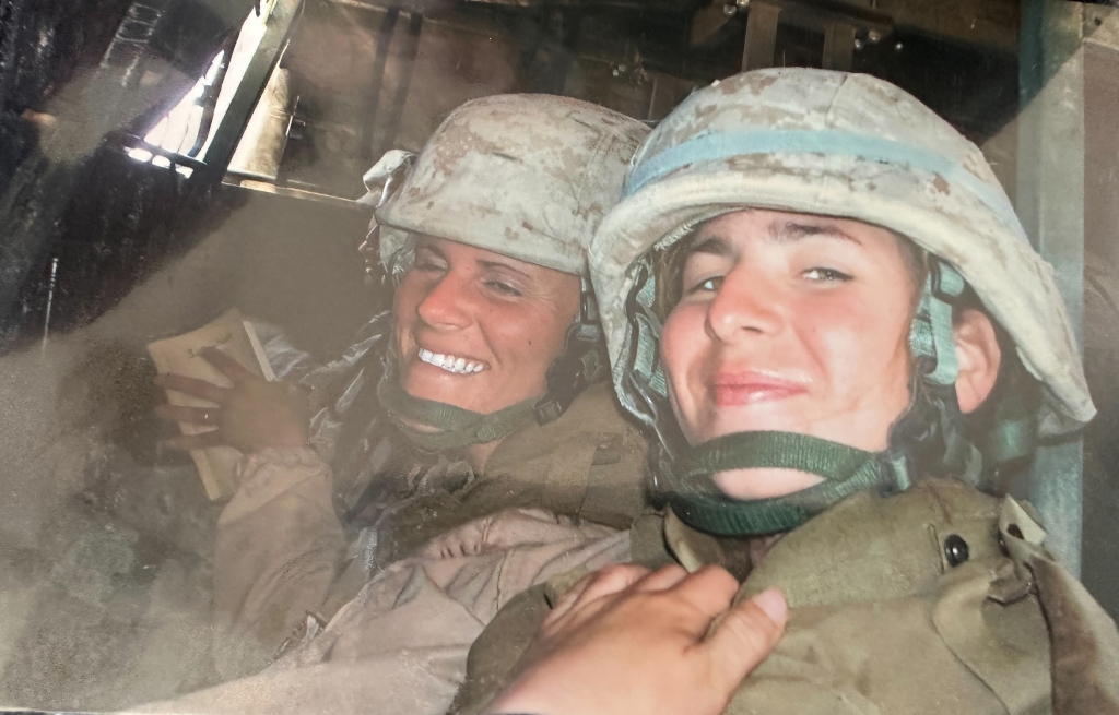 Amy Folwell, 37, from Rochester, New York, posing with another solider while on the Lioness team for the United States Marines Corps in 2007. 