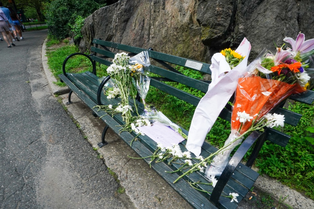 Plenty of flowers and bouquets were left on the bench dedicated to the crooner. 
