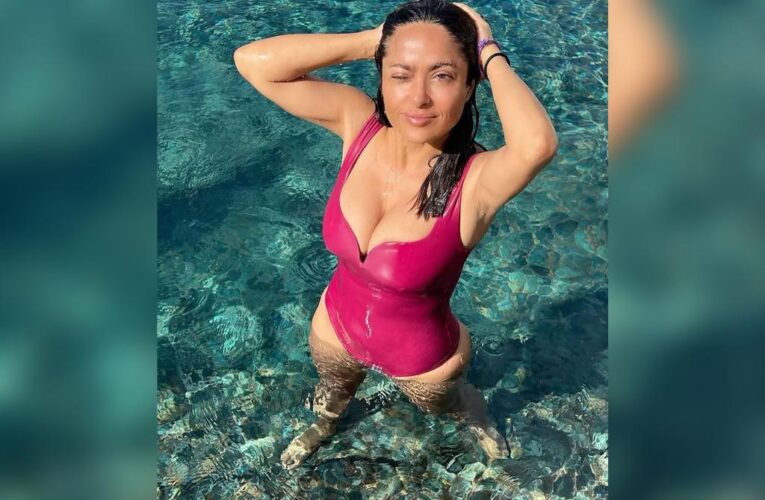 Salma Hayek strips down, takes dip in hot pink bathing suit