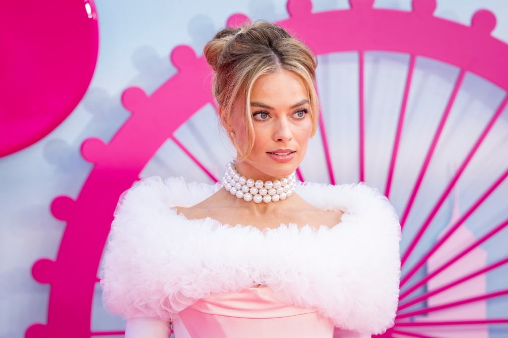 Margot Robbie poses for photographers upon arrival at the premiere of the film 'Barbie' on Wednesday, July 12, 2023, in London.