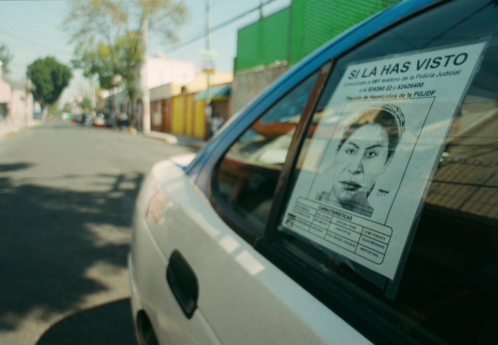 Composite drawing of a killer who turned out to be Juana Barraza, on the window of a police car
