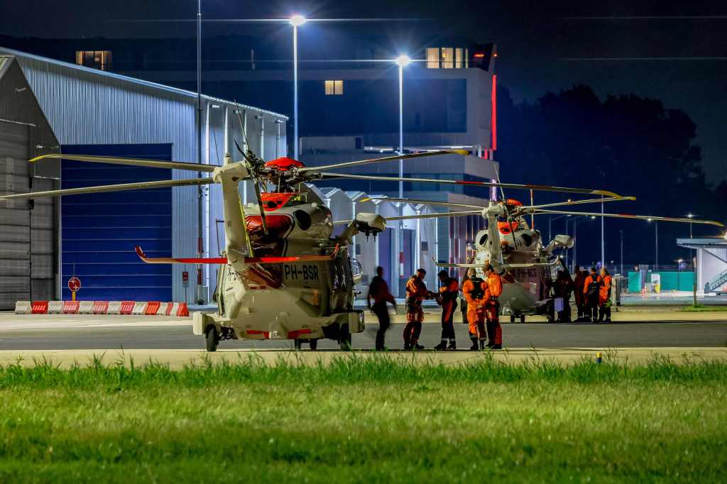 Coast Guard helicopters involved in the rescue operation on the ship Fremantle Highway are seen on the tarmac at Rotterdam The Hague Airport, in the Netherlands.