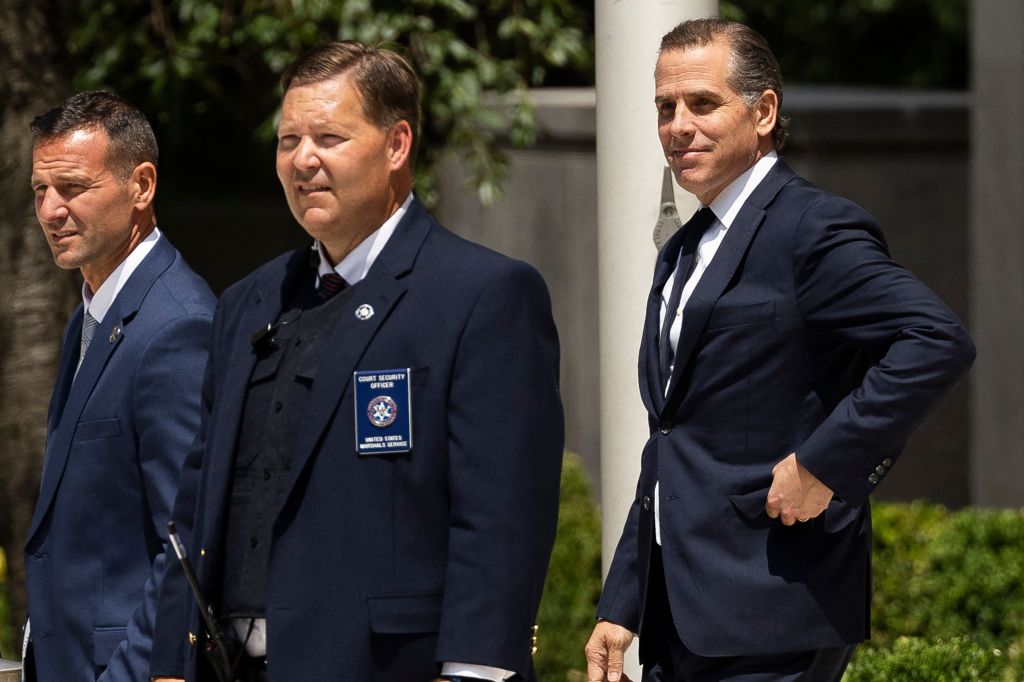 Hunter Biden, son of US President Joe Biden (R), leaves the J. Caleb Boggs Federal Building in Wilmington, Delaware, 