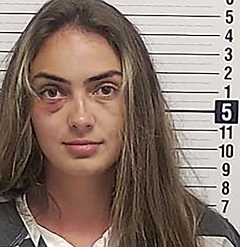 Macy Regan, 23, took a bite out of Stiles after pointing a gun at her. 