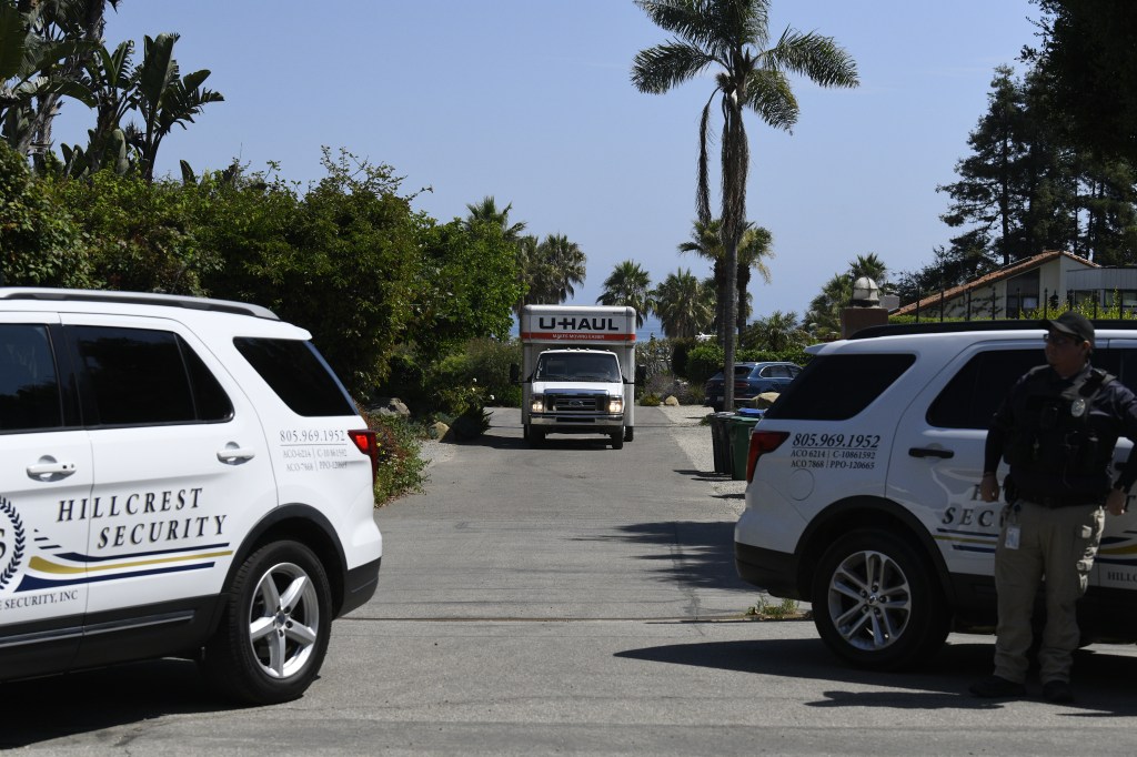 The trucks were spotted coming and going from the Carpinteria home.