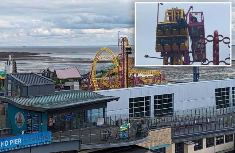 8 riders are rescued from top of 72-foot rollercoaster in England