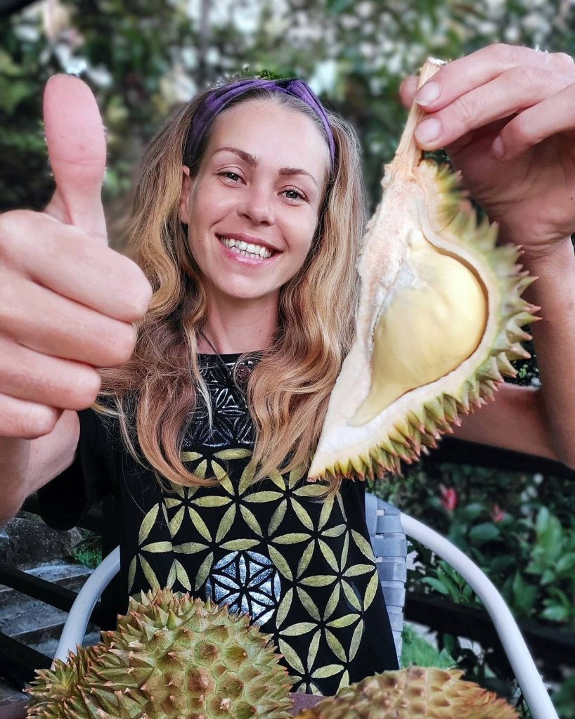Samsonova with a section of durian, the spiky, pungent fruit that's a delicacy throughout Southeast Asia.