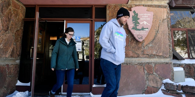 People leave the Visitor's Center at Rocky Mountain National Park