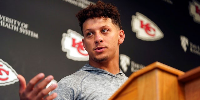 Patrick Mahomes talks to reporters