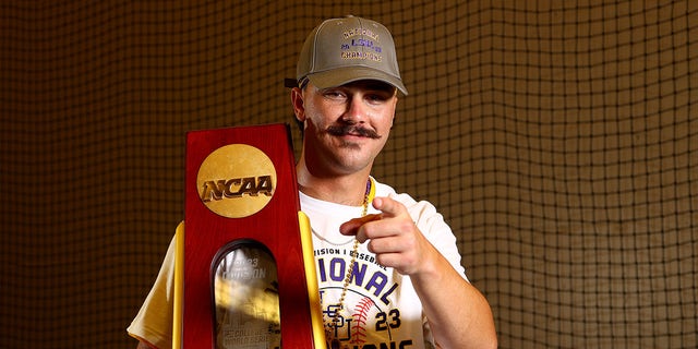 Paul Skenes with the trophy