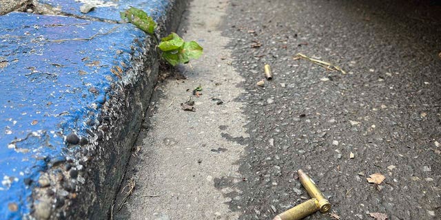 Spent shell casings are shown on the street in Philadelphia