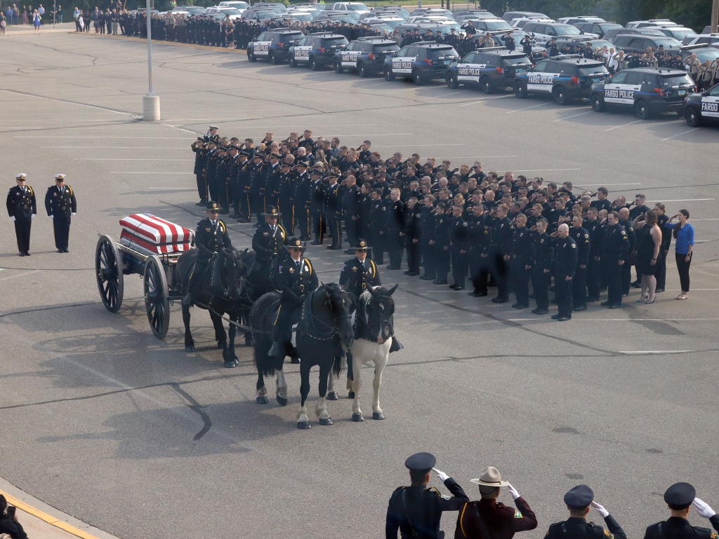 Dignitaries at the funeral service included Minnesota Gov. Tim Walz and U.S. Sen. Amy Klobuchar.