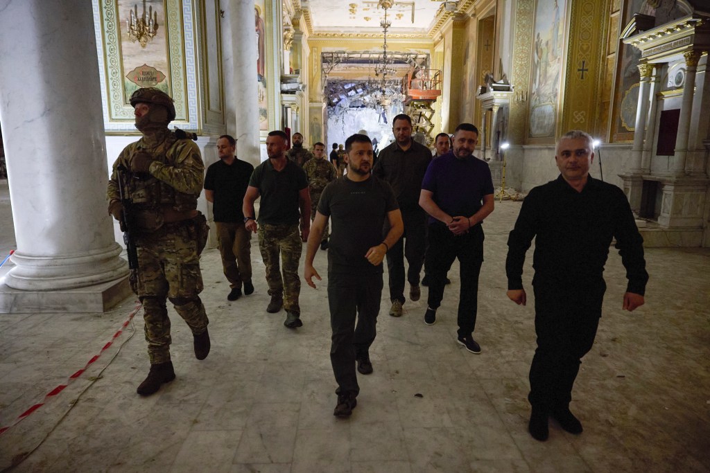 Ukrainian President Volodymyr Zelensky inspects damage of the Odesa Transfiguration Cathedral on Thursday, July 27.
