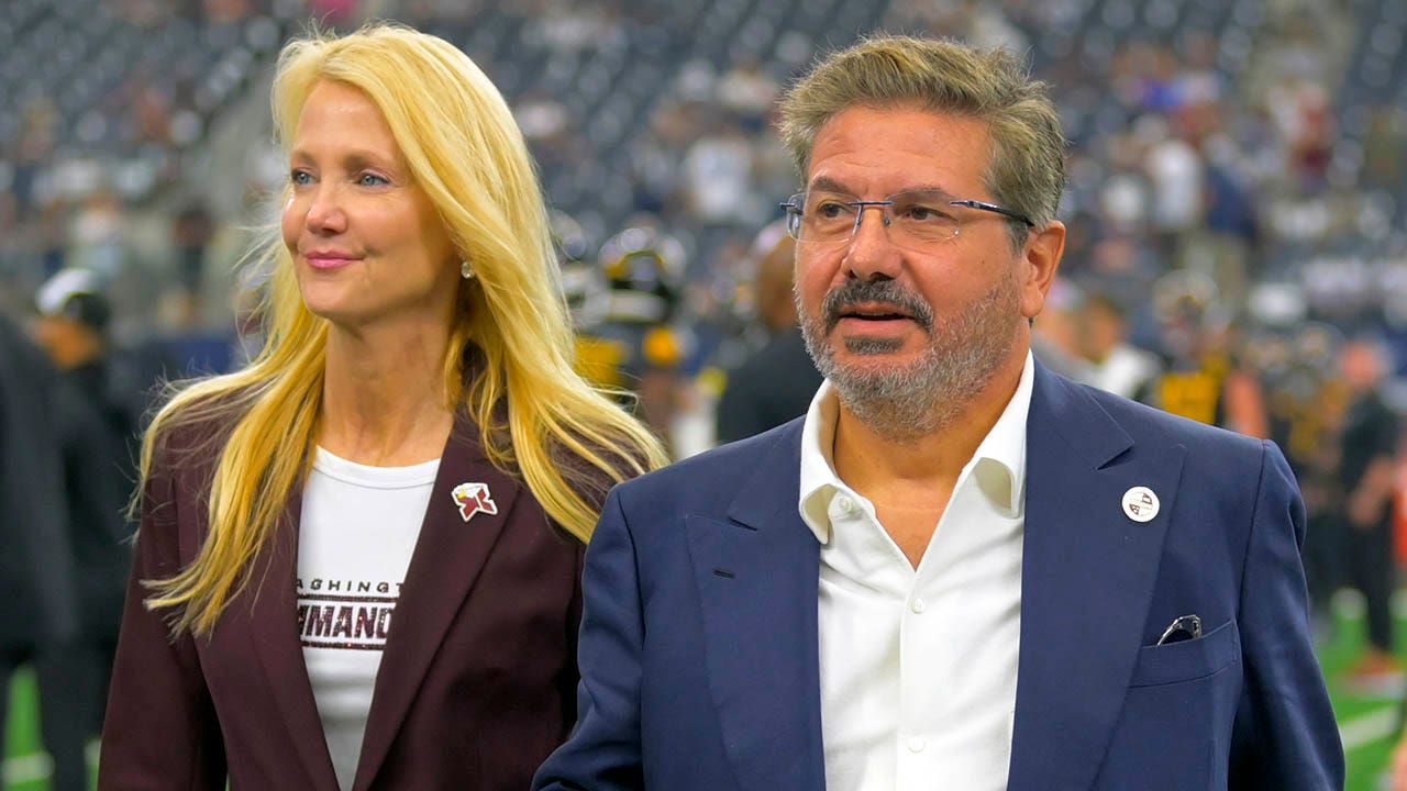 Dan and Tanya Snyder during an NFL game