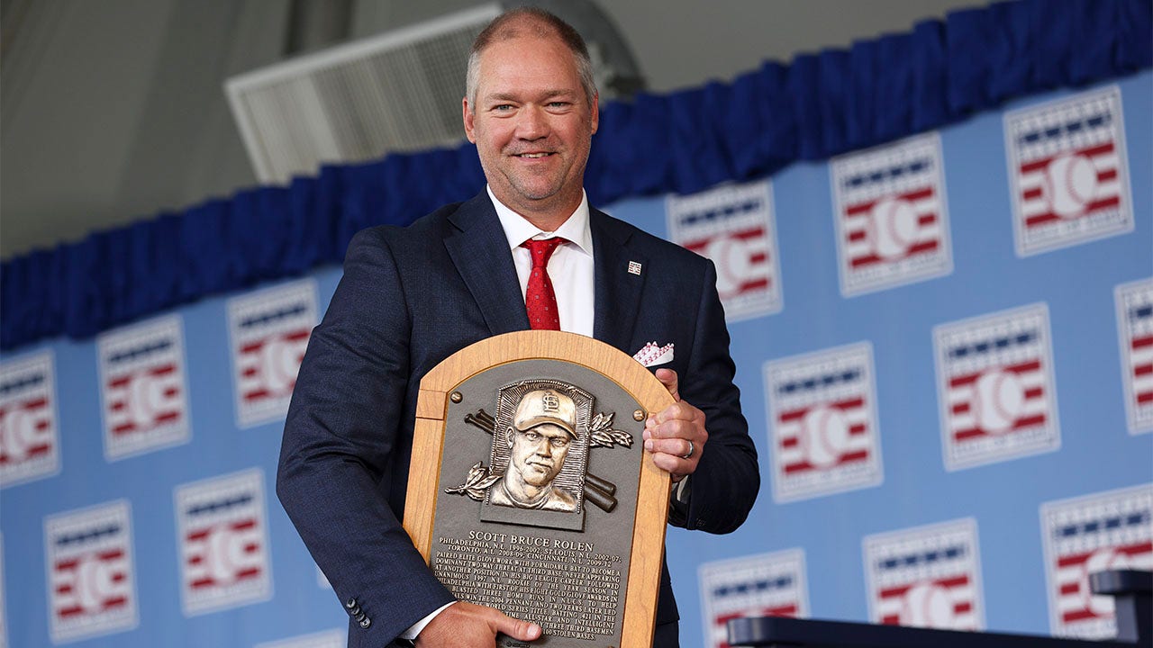 Scott Rolen poses with plaque