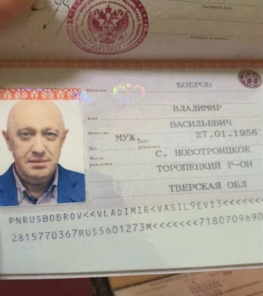 A passport with Prigozhin's picture but a different name