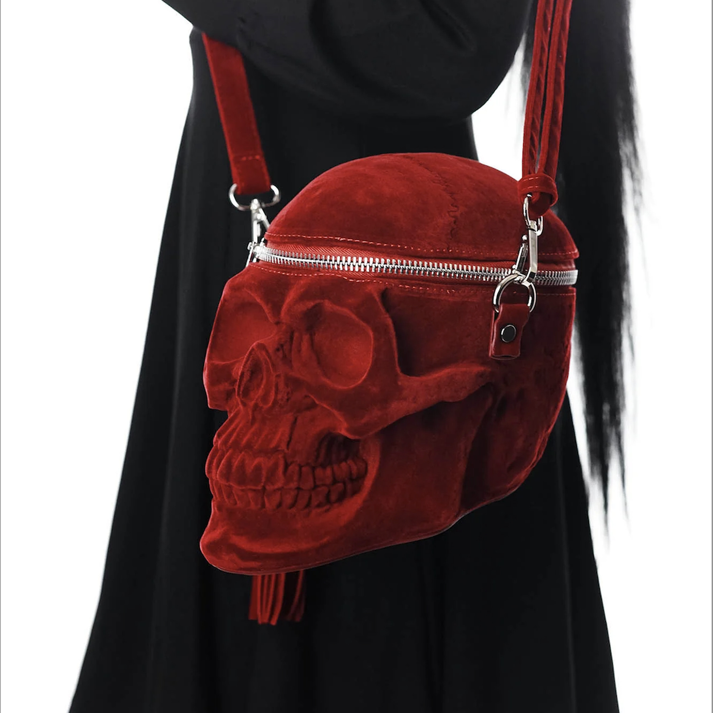 Handbag in the shape of a red skull